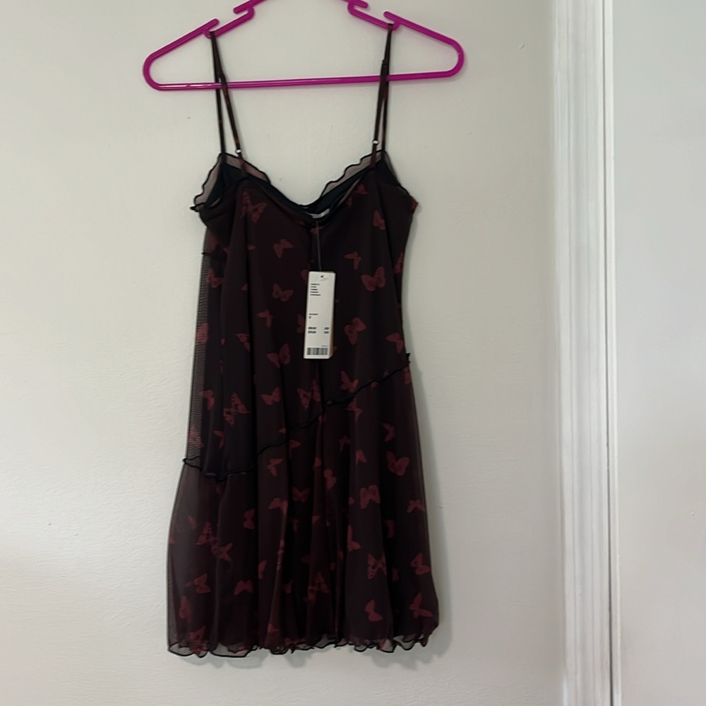 Cute new small petite dress with butterflies.